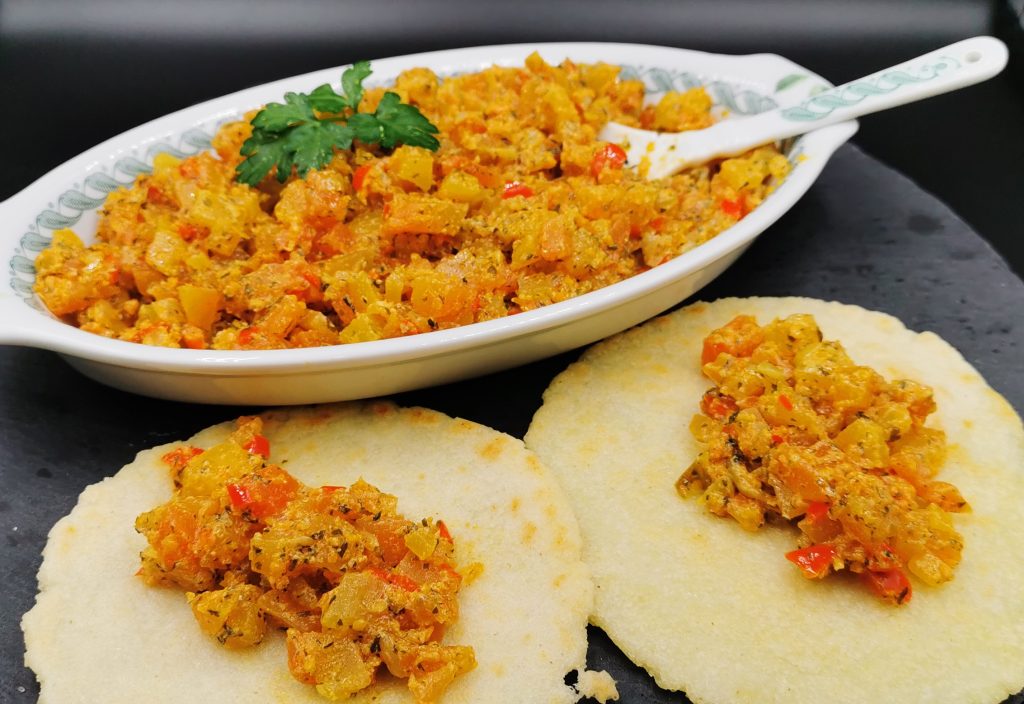 Verduras picadas finamente con textura cremosa y toques de zanahoria para Picadillo de Papaya