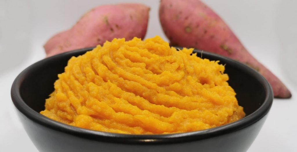 Crema suave y sedosa de color naranja intenso con textura untuosa para Puré de Camote